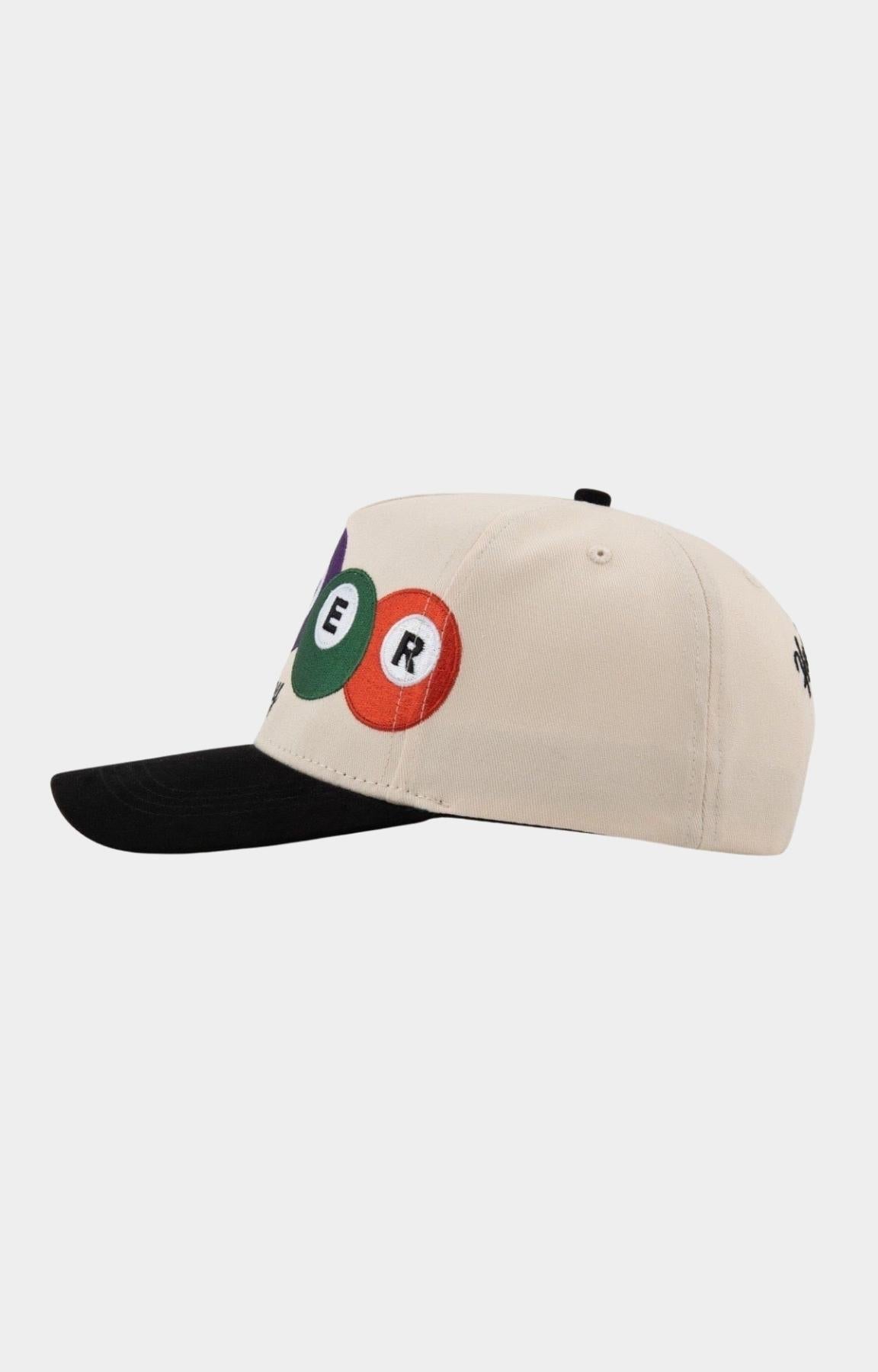 Close-up of embroidered billiard ball graphics on Paper Money Pool Shark Hat.