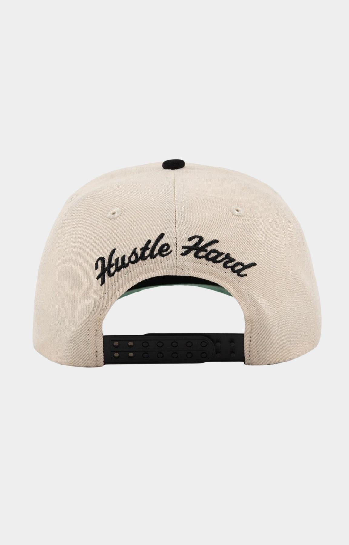 Back view showing Hustle Hard embroidery on Paper Money hat.