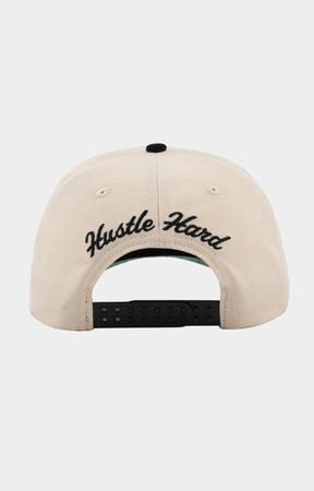 Back view showing Hustle Hard embroidery on Paper Money hat.