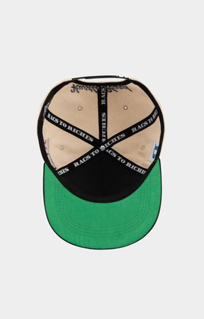 Adjustable snapback closure on Paper Money cream cap.