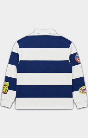 Politics Shirt Casa in blue featuring a 100% cotton construction, blue and white striped design, long sleeves, classic polo collar, SANITY lettering, and detailed embroidered patches.