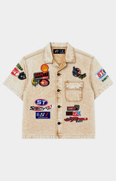 Politics SPR 95 khaki wash denim shirt with embroidered patch graphics front view.