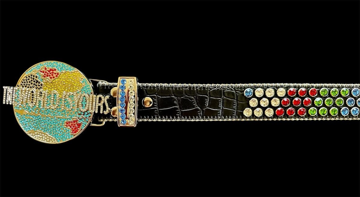 Close-up of crystal globe buckle on Post Human World Is Yours Belt