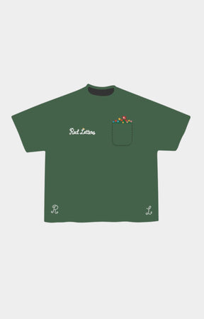 Red Letters At The Garden pocket tee in green front view.