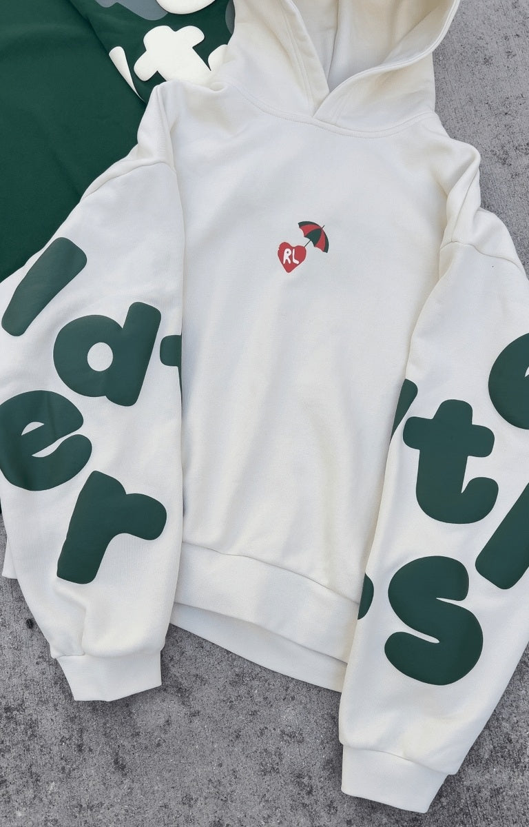 Close-up of graphic print and texture on Red Letters Main Beach Scattered Hoodie.