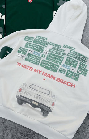 back profile showing baggy sleeve fit of Red Letters Main Beach Scattered Hoodie.