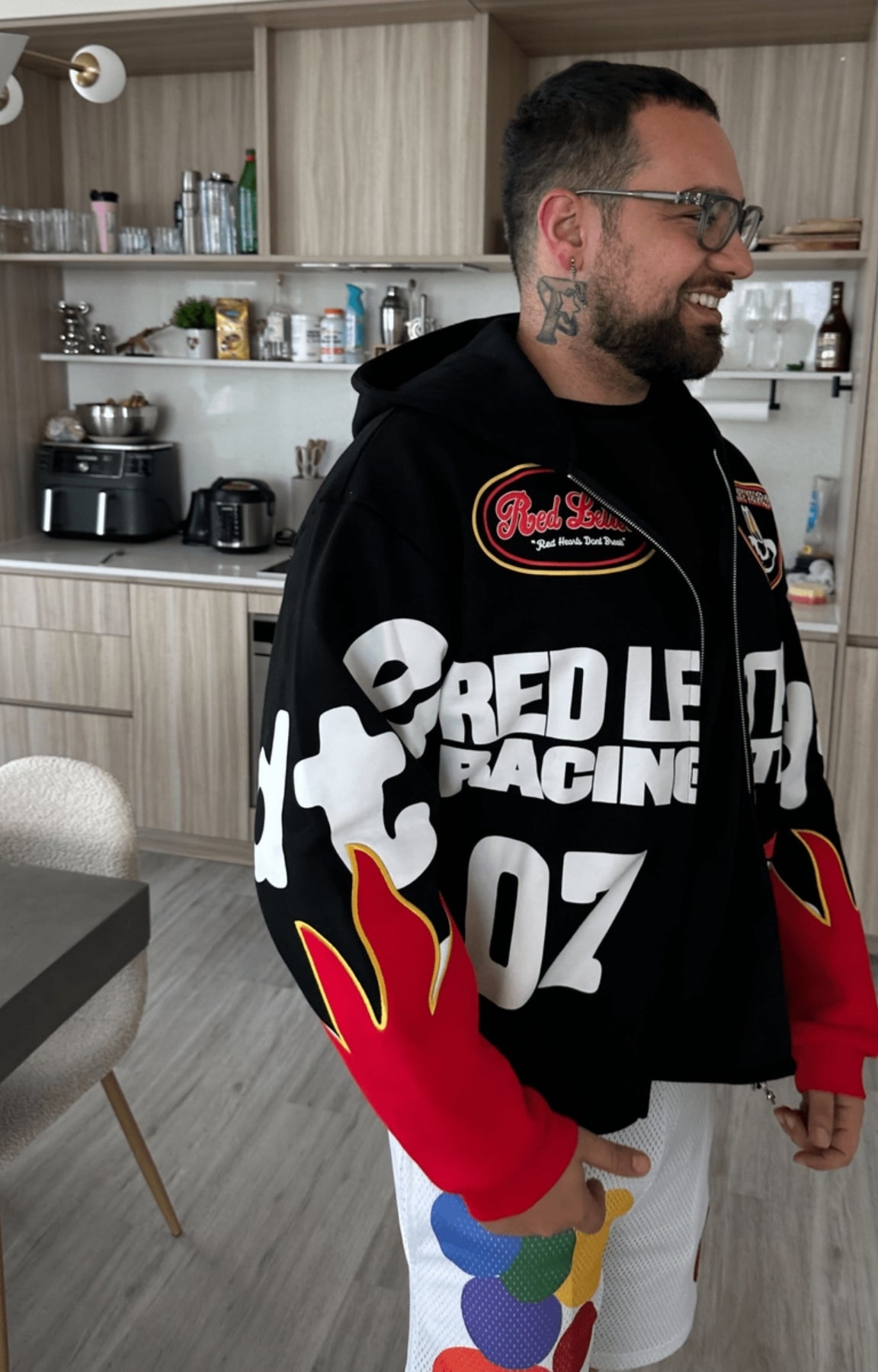 Red Letters Nashcar Scattered Zip Up Hoodie hidden side pocket.