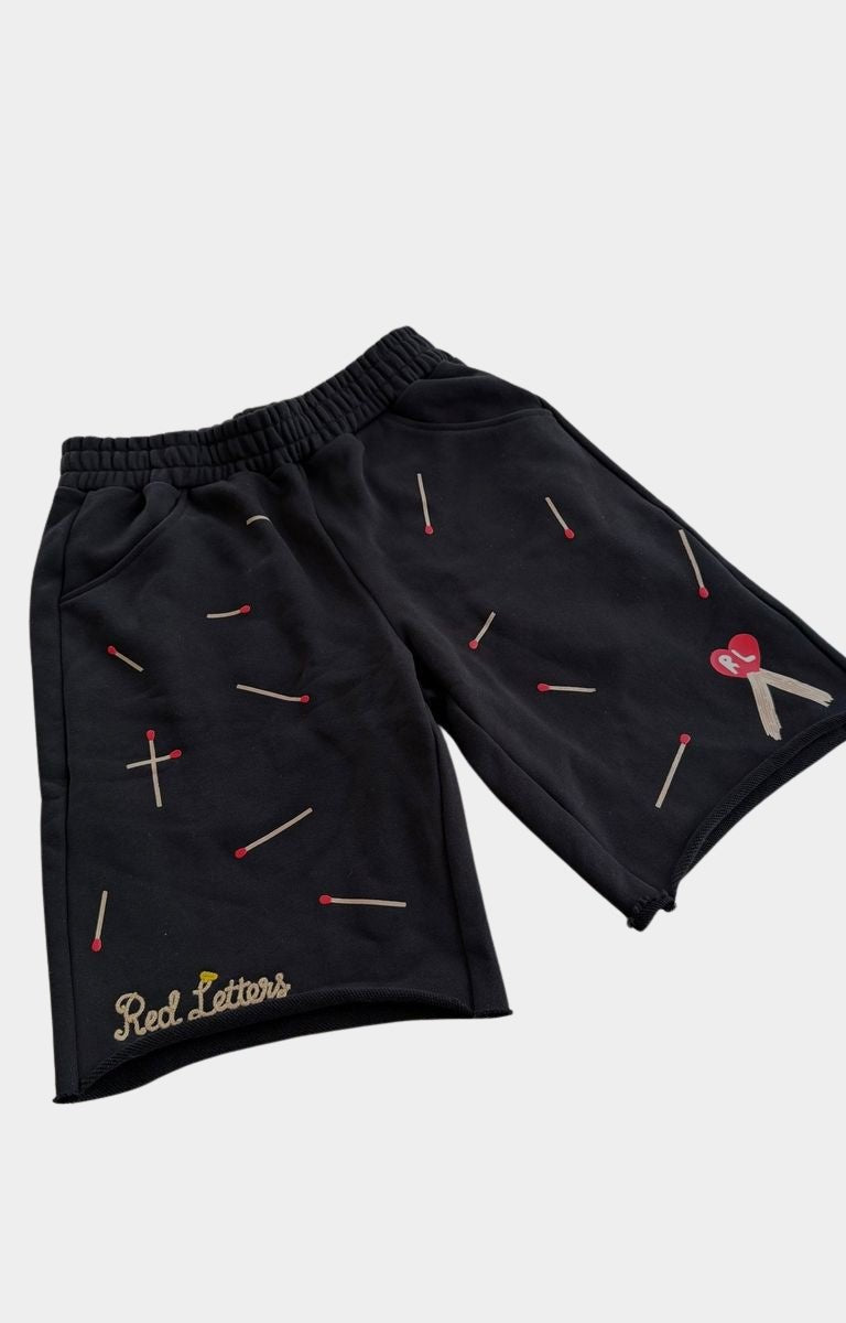 Relaxed fit Red Letters Start The Fire graphic shorts.