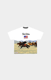 Red Letters Wild West short-sleeve t-shirt with a graphic print on the front. The print features the text 'Red Letters' above an American flag and a western scene of horse riders galloping across a grassy field.