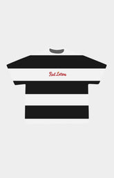 Red Letters Unlearn black and white stripe graphic tee front view.