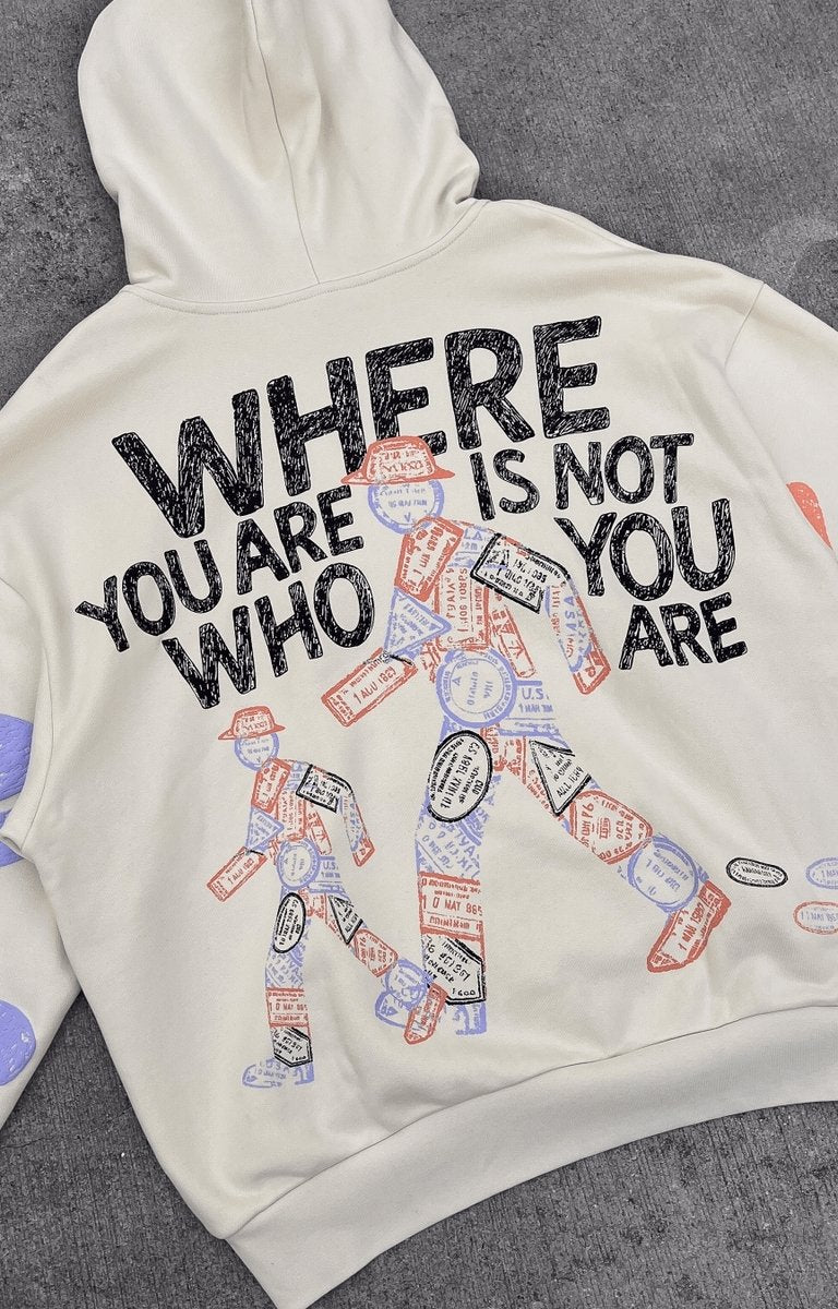 Close-up of hand-drawn letters and zip detail on Red Letters Where U Are hoodie