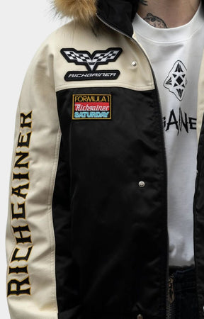 Rich Gainer racing patch embroidery on varsity jacket chest