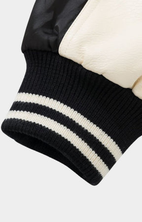 Ribbed cuff and hem detail on Rich Gainer varsity jacket.