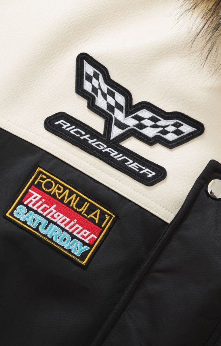 Styled Rich Gainer varsity jacket with faux fur hood streetwear look