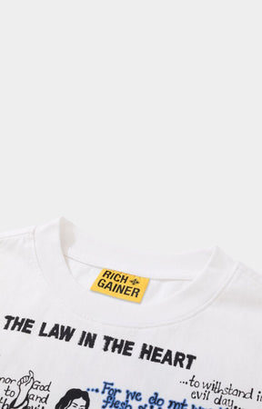 Crewneck collar detail on Rich Gainer white graphic t-shirt.