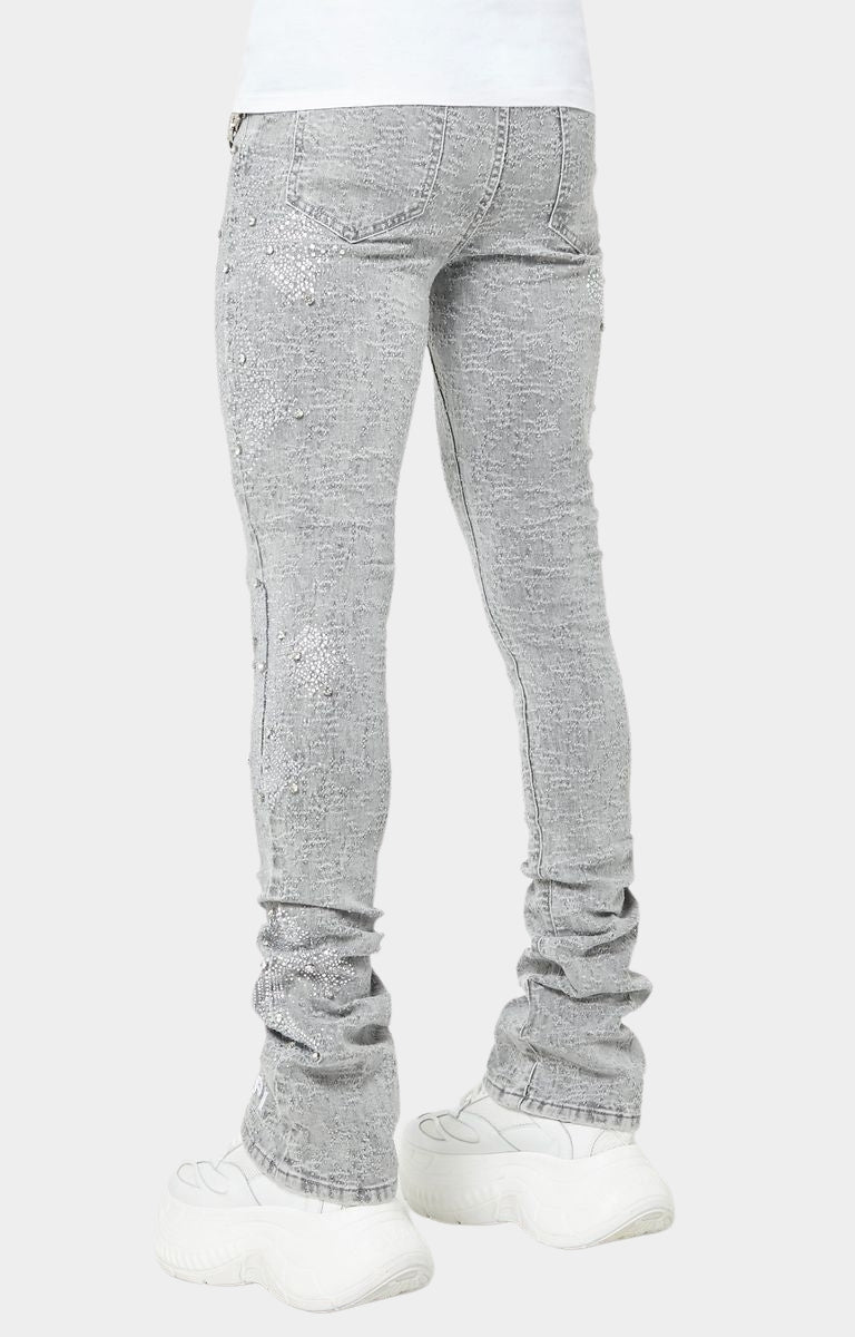 Back view of GUAPI Smoke Grey distressed skinny jeans with cross motifs.