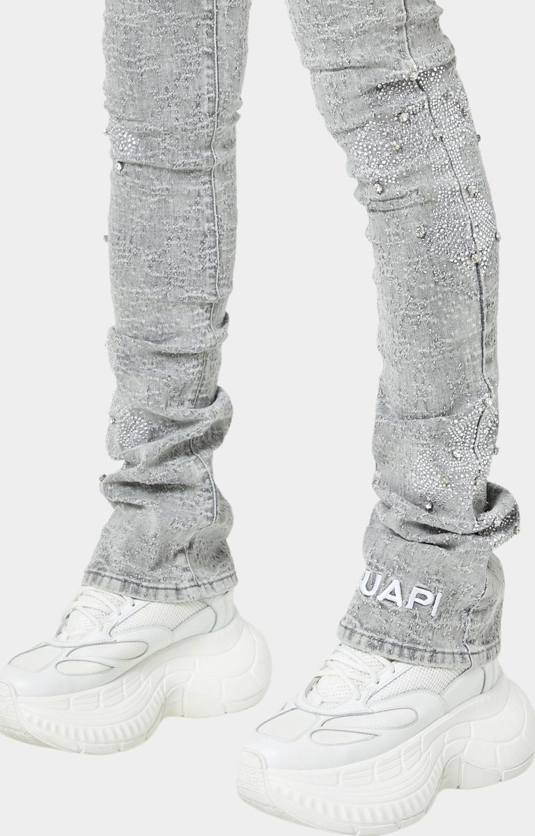 "Men’s GUAPI skinny jeans in Smoke Grey with rhinestone accents.