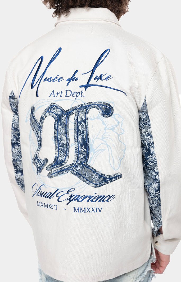 Back view white over shirt with tapestry embroidery.