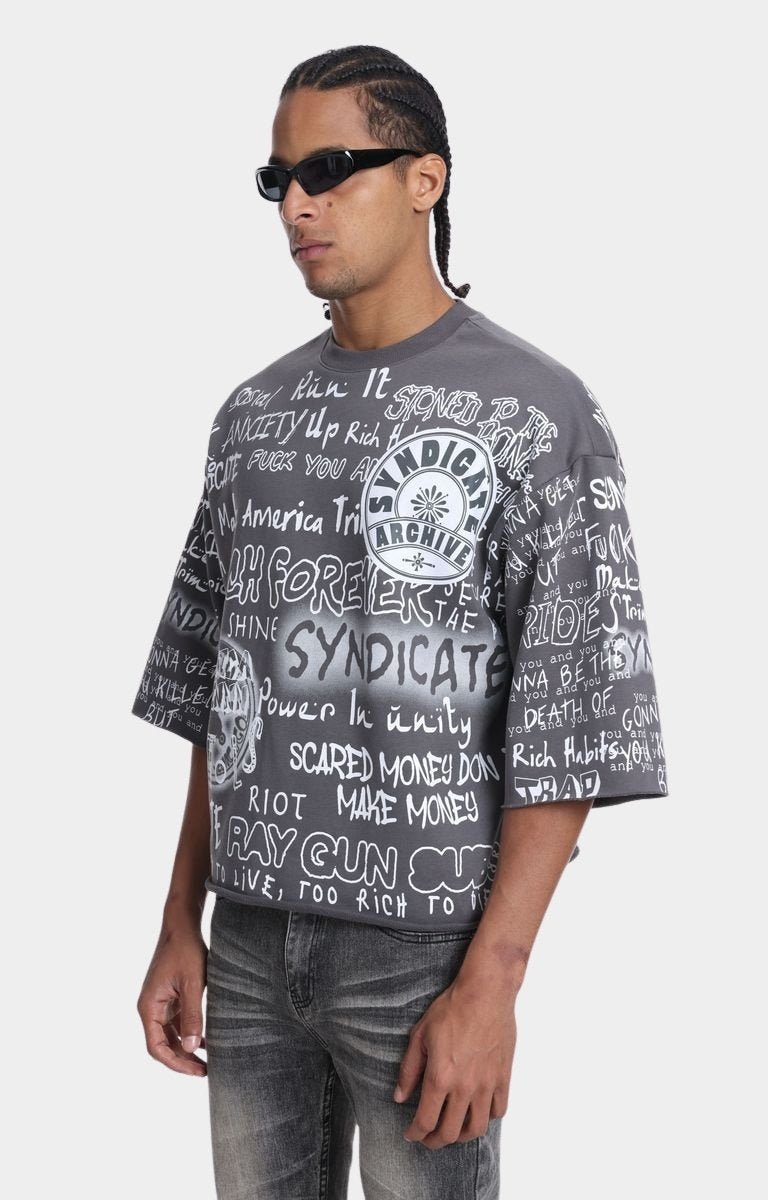 Close-up of Syndicate 16 all-over wolf grey graphic print design.
