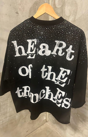 Back view featuring large Heart of the Trenches text print.
