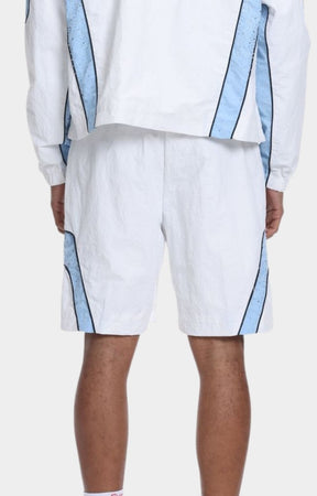 Back view of The Syndicate Baby Blue nylon shorts