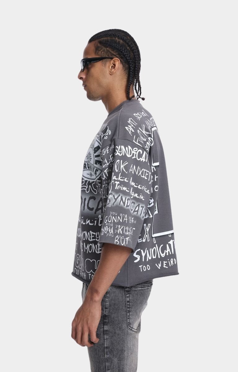 Oversized sleeve detail on Syndicate cropped tee.
