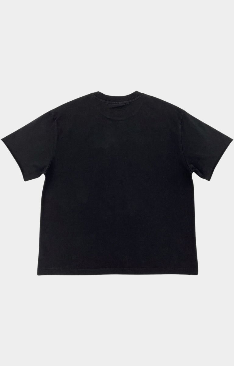 Black wash oversized graphic t shirt with distressed Painless artwork.
