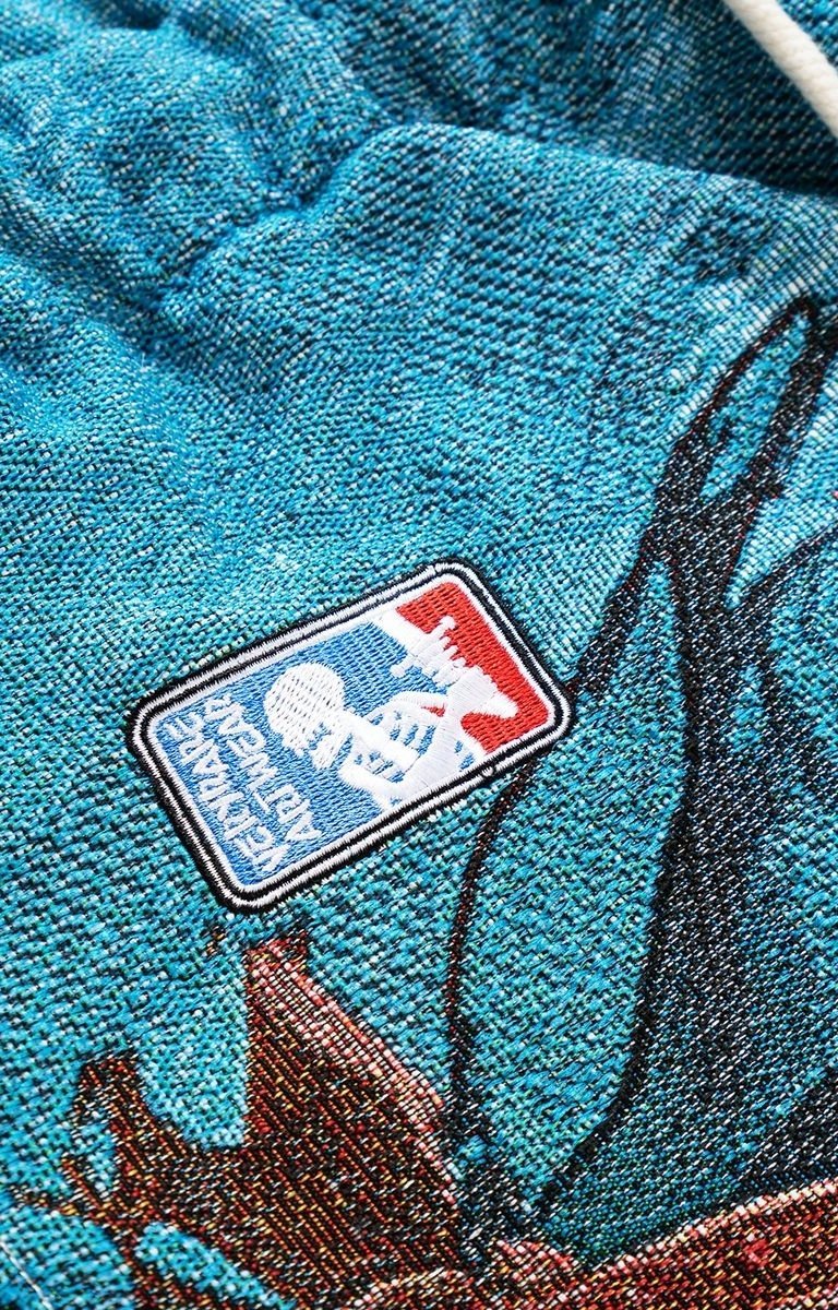 Embroidery close-up on VeryRare Thorns/War Pants Raf Reyes design.