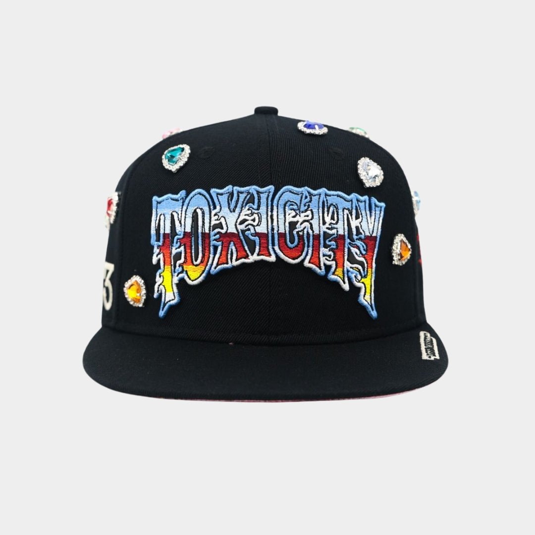 Front view of Black Toxicity 333 Snapback Hat with flame-styled embroidery