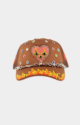 Toxicity LOVE HARD trucker hat in brown front view.