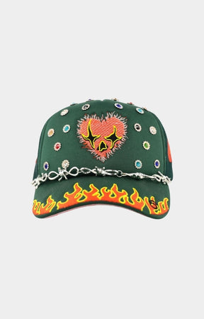 Toxicity LOVE HARD trucker hat in green front view.