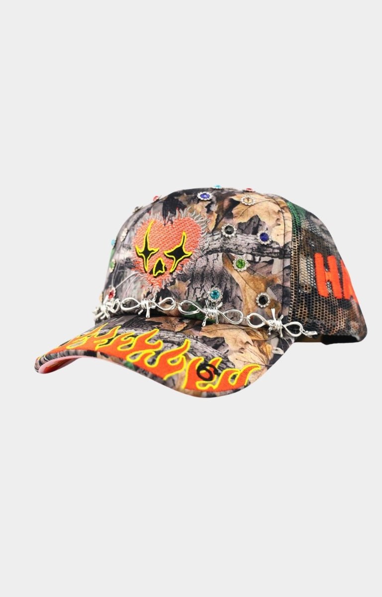 Angled view of LOVE HARD structured camo cap.