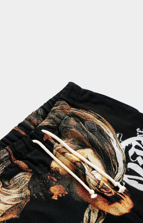 Detail closeup of Caravaggio artwork and appliqué patch on VeryRare Calling of Saint Matthew Pants.