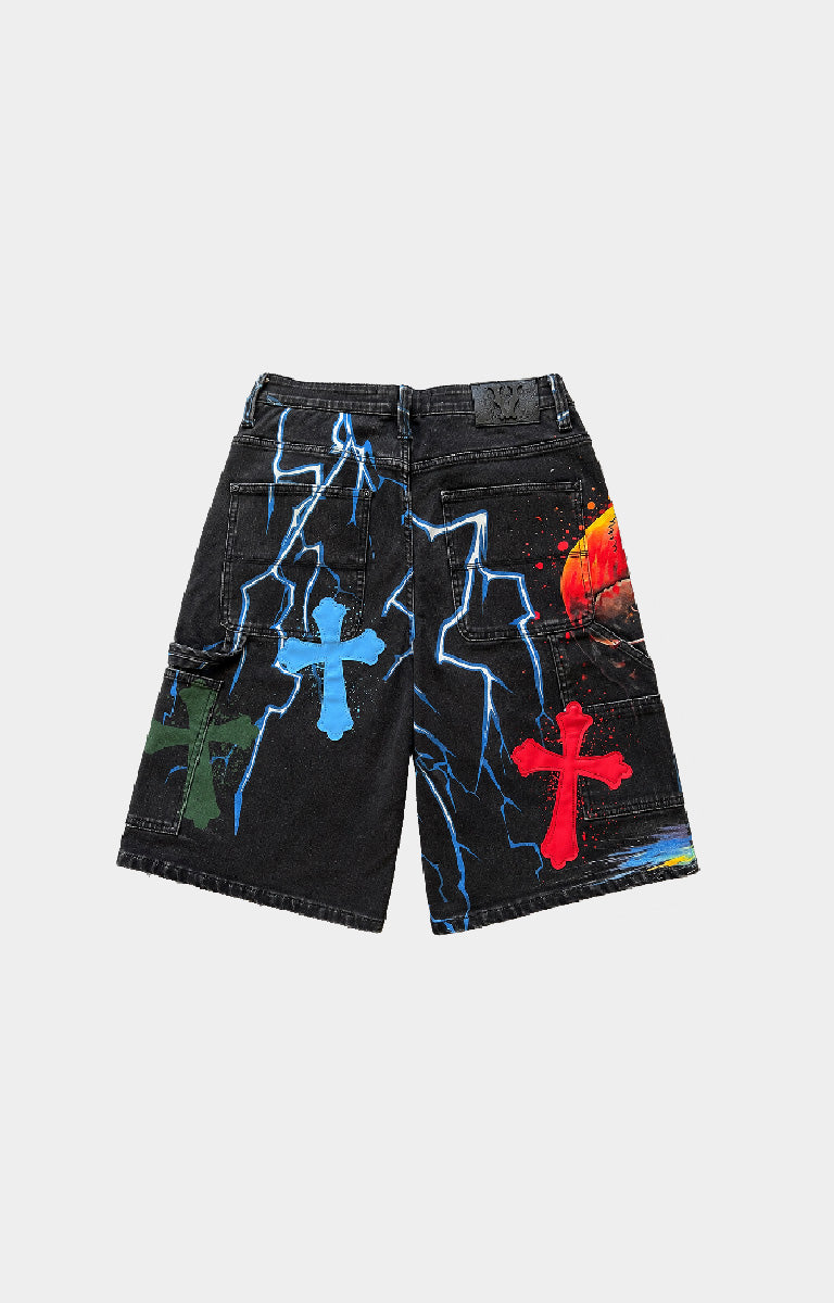 Vicious premium Black denim shorts featuring a colorful graphic print with blue lightning bolts, green and red crosses, and a red/orange circular design.