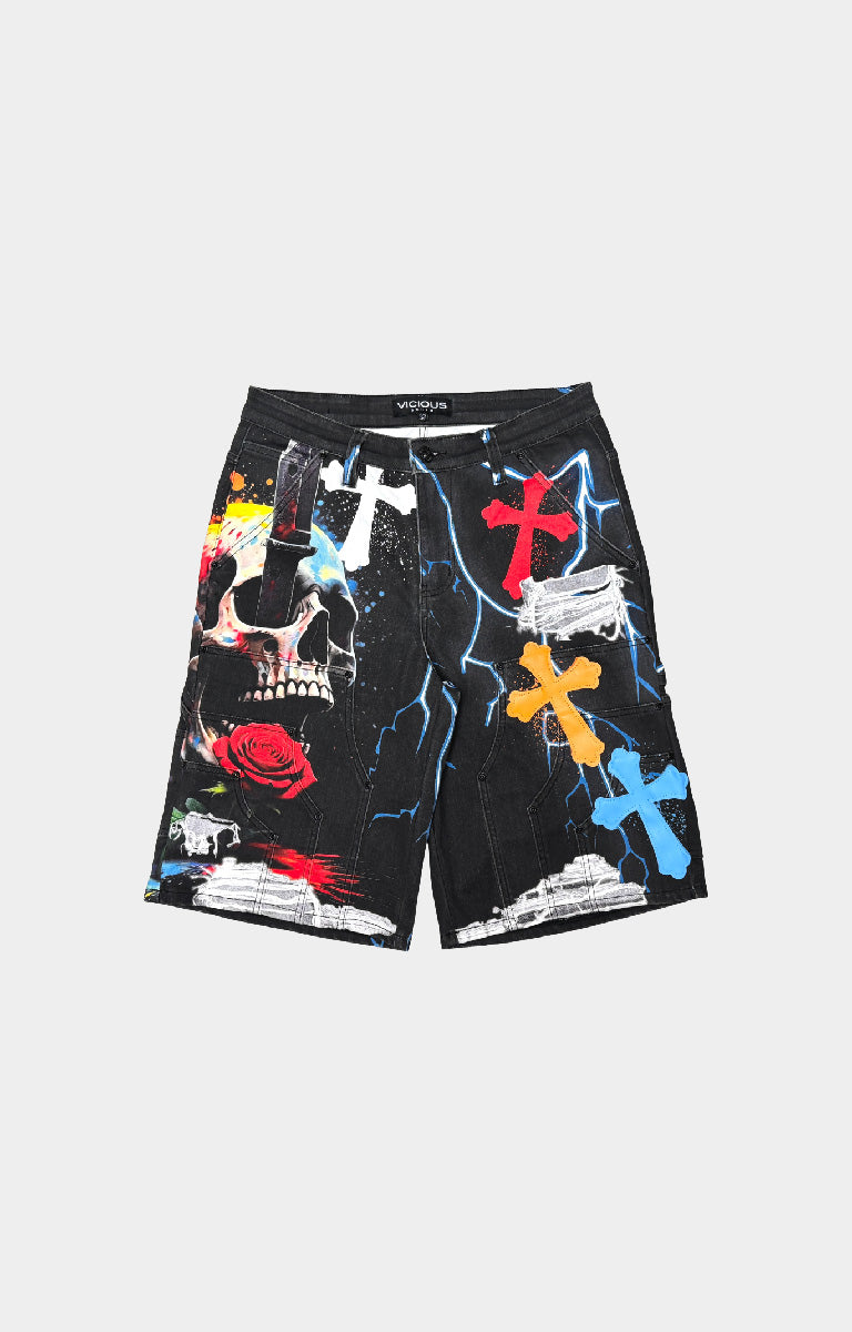 Vicious Black denim shorts featuring a colorful patchwork with crosses, a skull, a red rose, lightning bolts, and paint splatters.