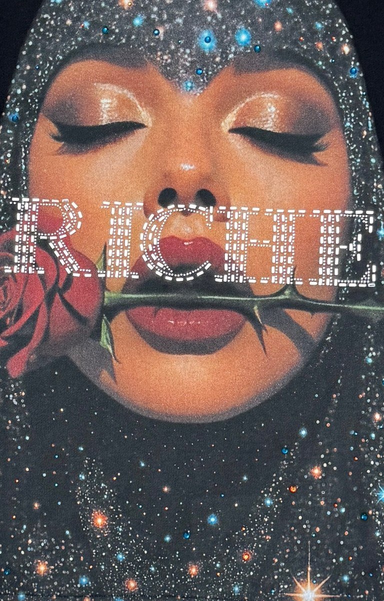 Live Rose printed graphic detail on Vie+Riche sweatshirt.