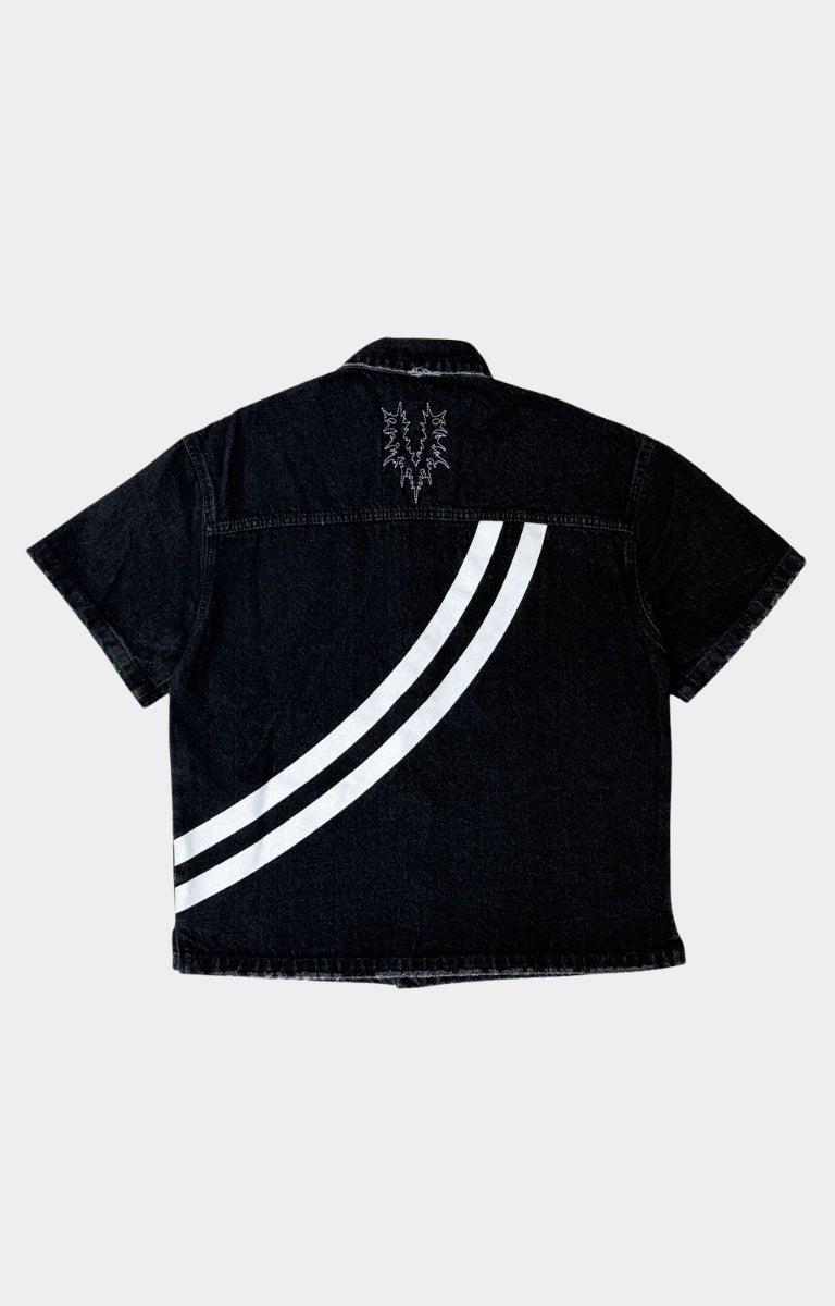 Close-up of vintage patch collage on shirt