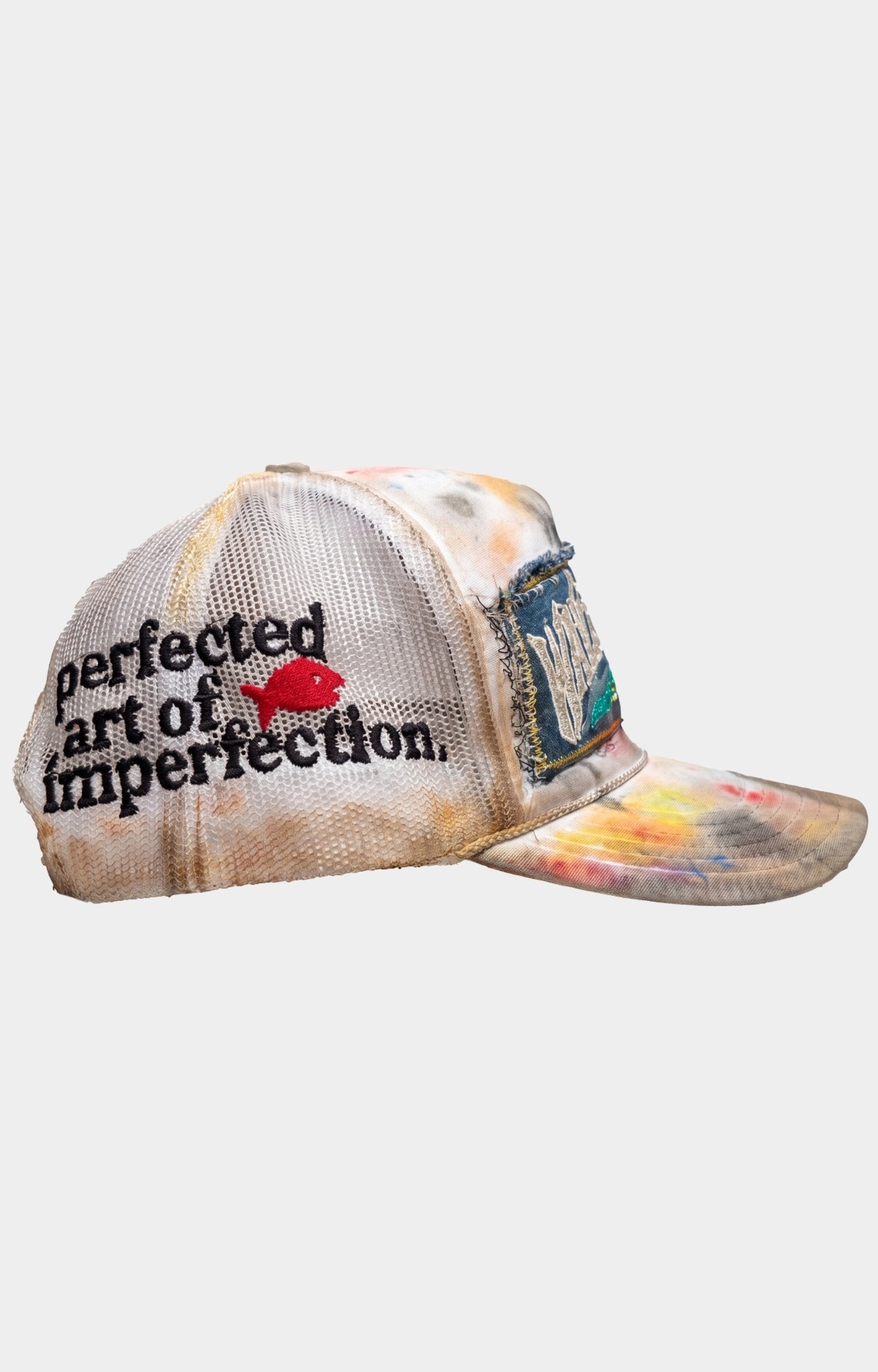 Waves x Sauce BEACH BUM STITCHED TRUCKER featuring distressed embroidered patches, hand-painted details, stitched artwork, mesh trucker construction and a vintage-inspired finish.