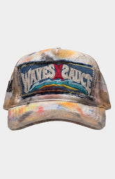 Waves x Sauce BEACH BUM STITCHED TRUCKER featuring distressed embroidered patches, hand-painted details, stitched artwork, mesh trucker construction and a vintage-inspired finish.