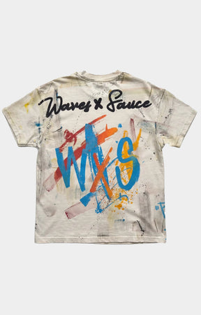 Waves x Sauce The World Is Yours Tee in Cream, made from 100% heavyweight cotton with a vintage wash, hand-painted and screen-printed artwork, distressed detailing, and one-of-one character. Made in Oakland, California by artist Skyler Clay.